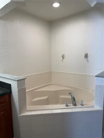 a close up of a bathtub