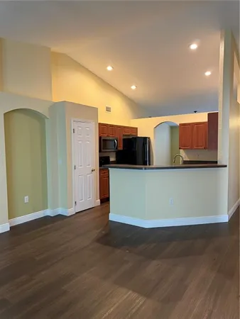 a view of a kitchen with a sink