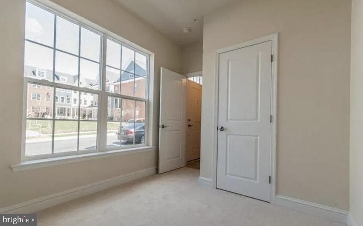 44 Linden Place Towson, MD 21286 - Photo 13 of 16 a view of an empty room with a window