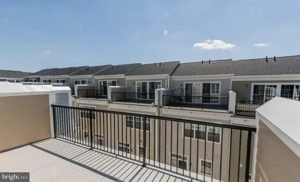 a view of a house with a roof deck