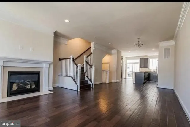 a view of livingroom with furniture and a fireplace