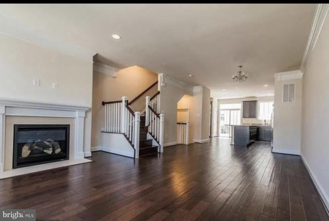 44 Linden Place Towson, MD 21286 - Photo 2 of 16 a view of livingroom with furniture and a fireplace
