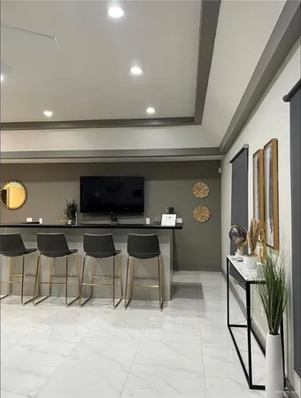 a view of a chairs and table in a room