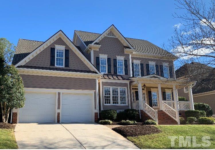 4213 Batiste Road Raleigh, NC 27613 - Photo 1 of 30 a front view of a house with garden