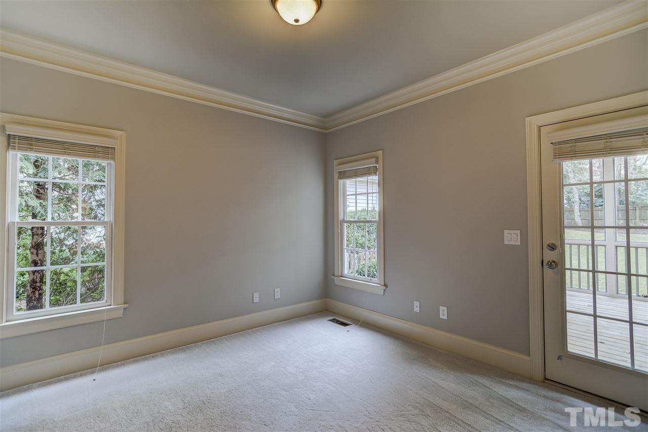 4213 Batiste Road Raleigh, NC 27613 - Photo 11 of 30 an empty room with windows and closet