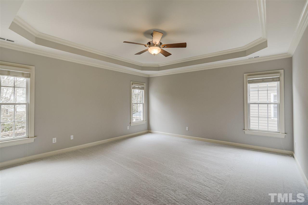 4213 Batiste Road Raleigh, NC 27613 - Photo 13 of 30 wooden floor in an empty room with a window