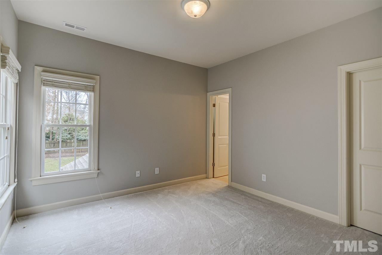 4213 Batiste Road Raleigh, NC 27613 - Photo 16 of 30 a view of an empty room with a window