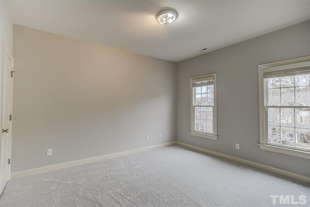 4213 Batiste Road Raleigh, NC 27613 - Photo 20 of 30 an empty room with windows