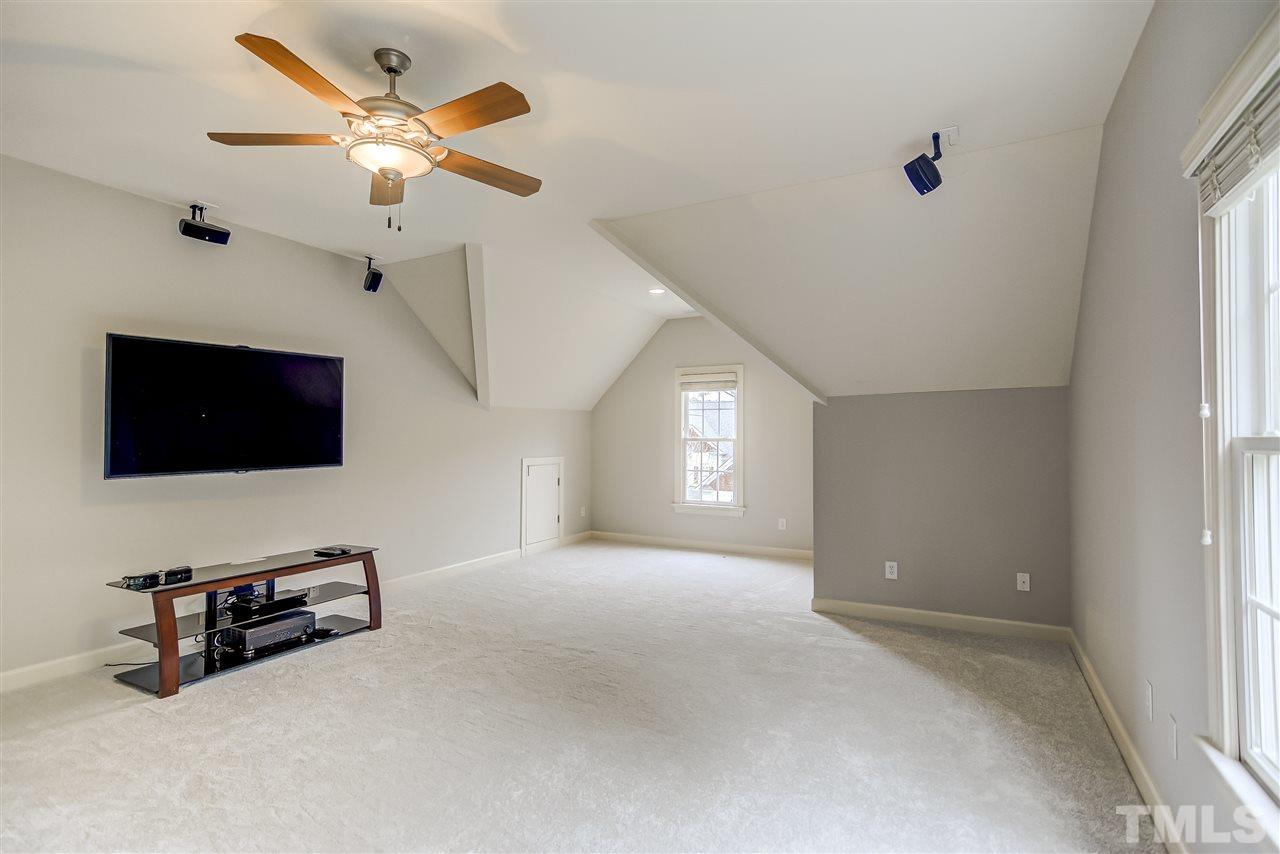 4213 Batiste Road Raleigh, NC 27613 - Photo 23 of 30 en empty room with windows and fan