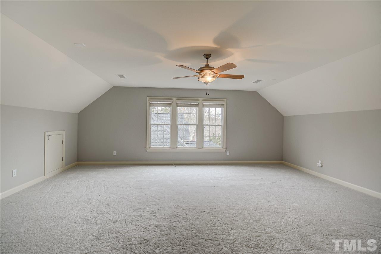4213 Batiste Road Raleigh, NC 27613 - Photo 26 of 30 a view of an empty room with a window
