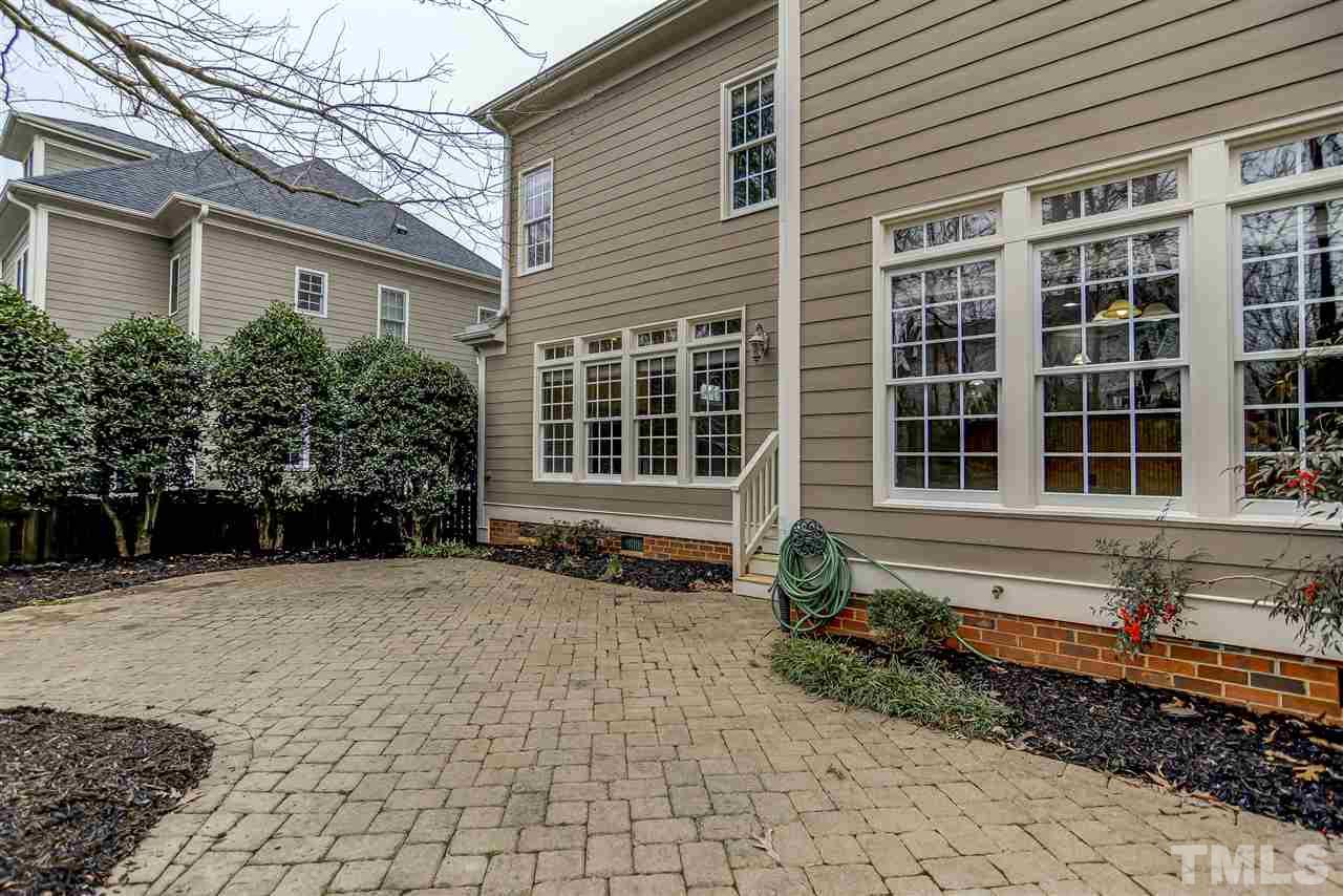 4213 Batiste Road Raleigh, NC 27613 - Photo 29 of 30 a front view of a house with a yard