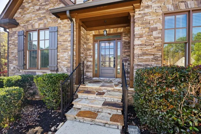 a front view of a house with a porch