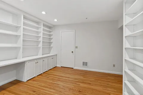 a view of an empty room with empty racks