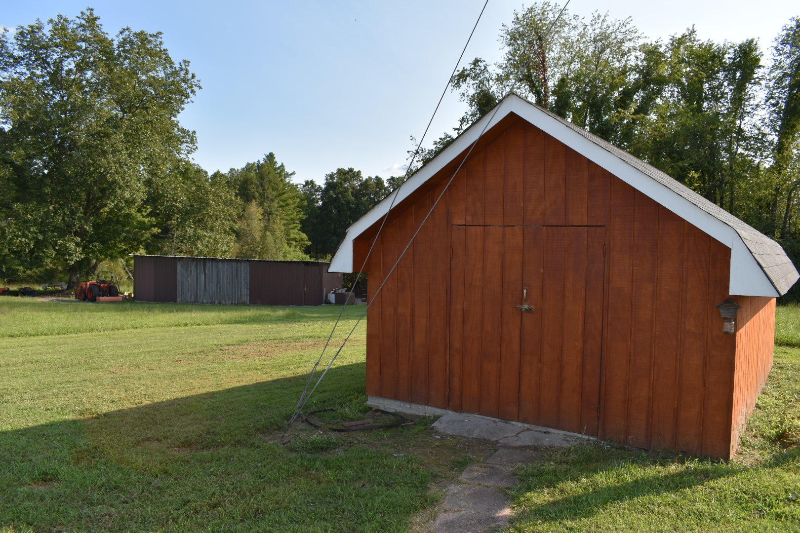 1513 Leatherwood Road Oneida, TN 37841 - Photo 11 of 37 a view of a back yard with a wooden fence