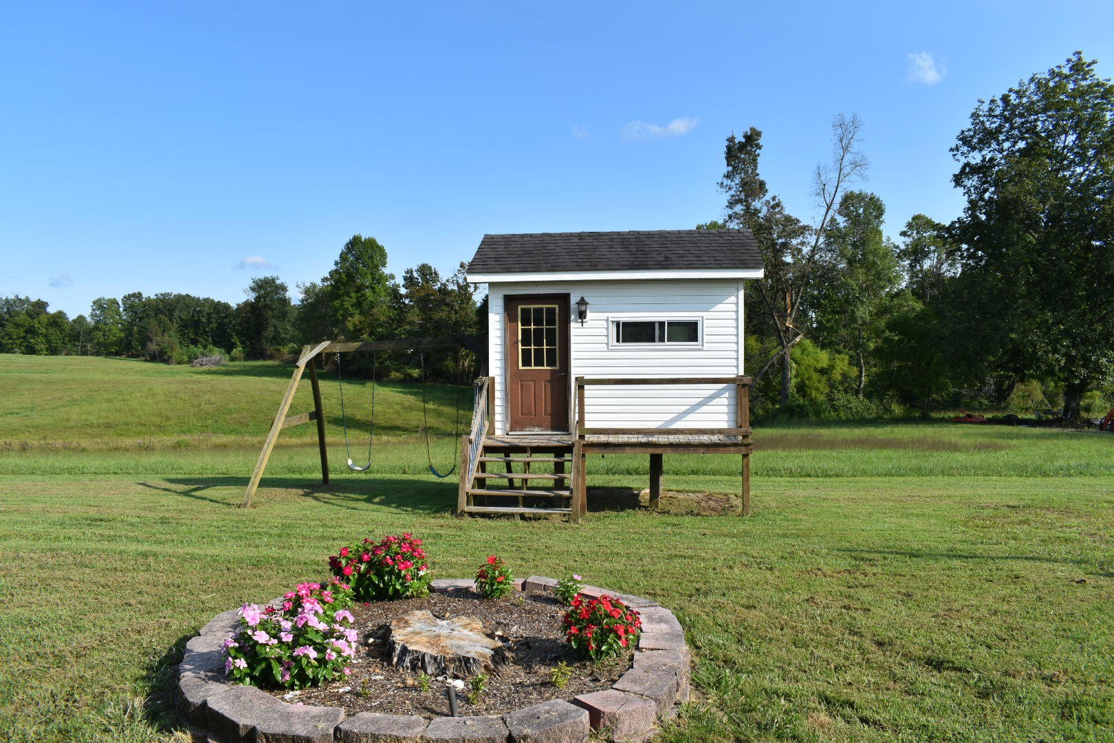 1513 Leatherwood Road Oneida, TN 37841 - Photo 12 of 37 a view of a house with a yard