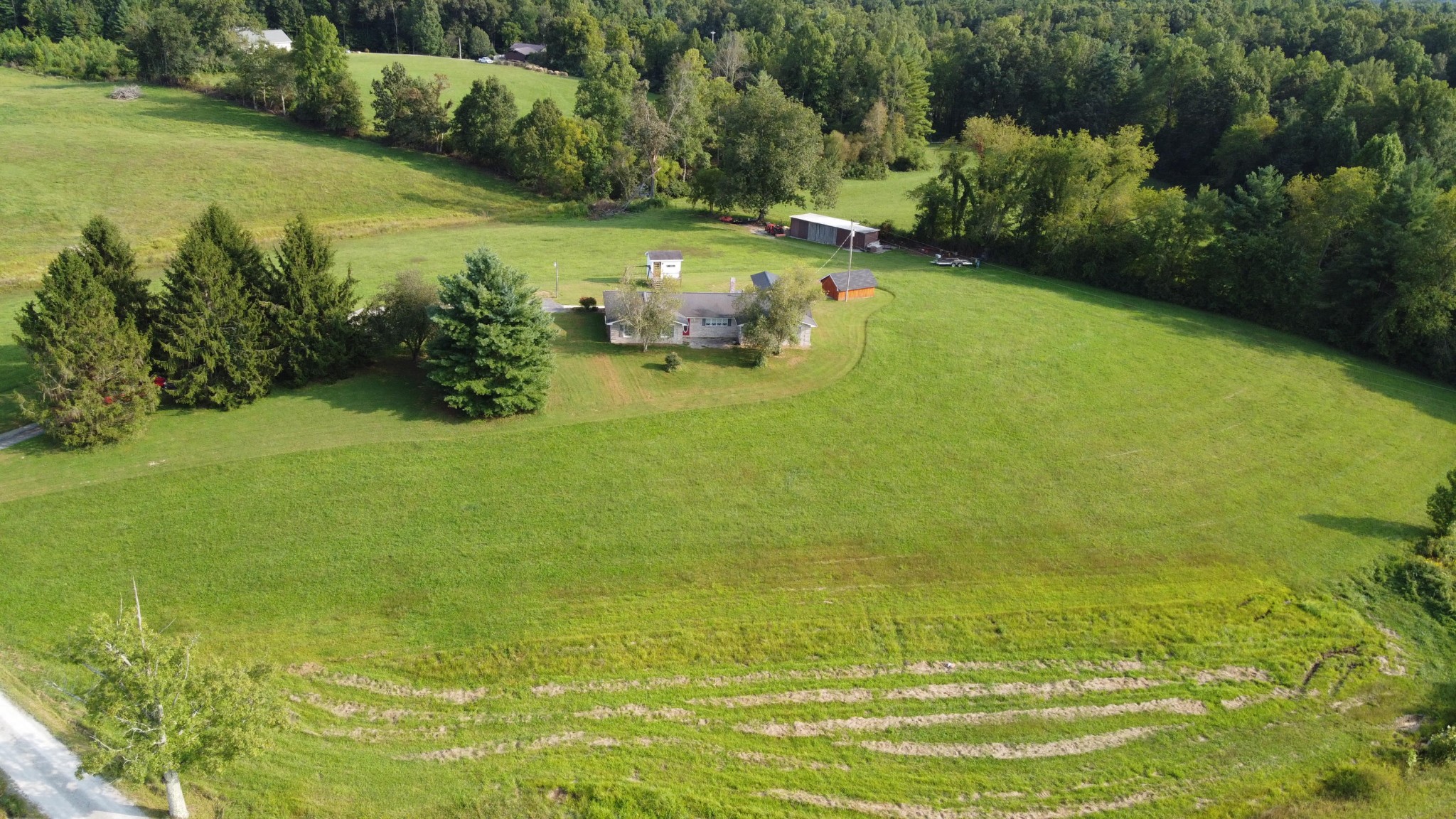 1513 Leatherwood Road Oneida, TN 37841 - Photo 32 of 37 a view of a lake with a houses
