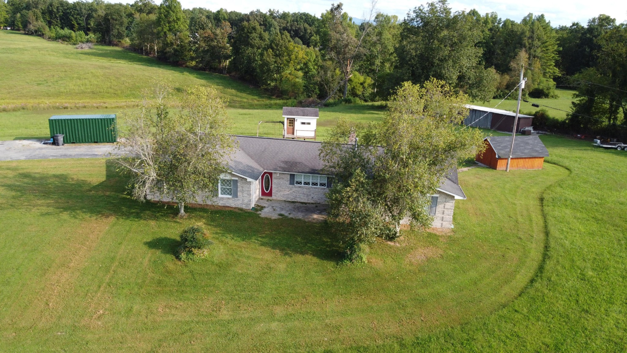 1513 Leatherwood Road Oneida, TN 37841 - Photo 36 of 37 a view of a lake with a house in the background