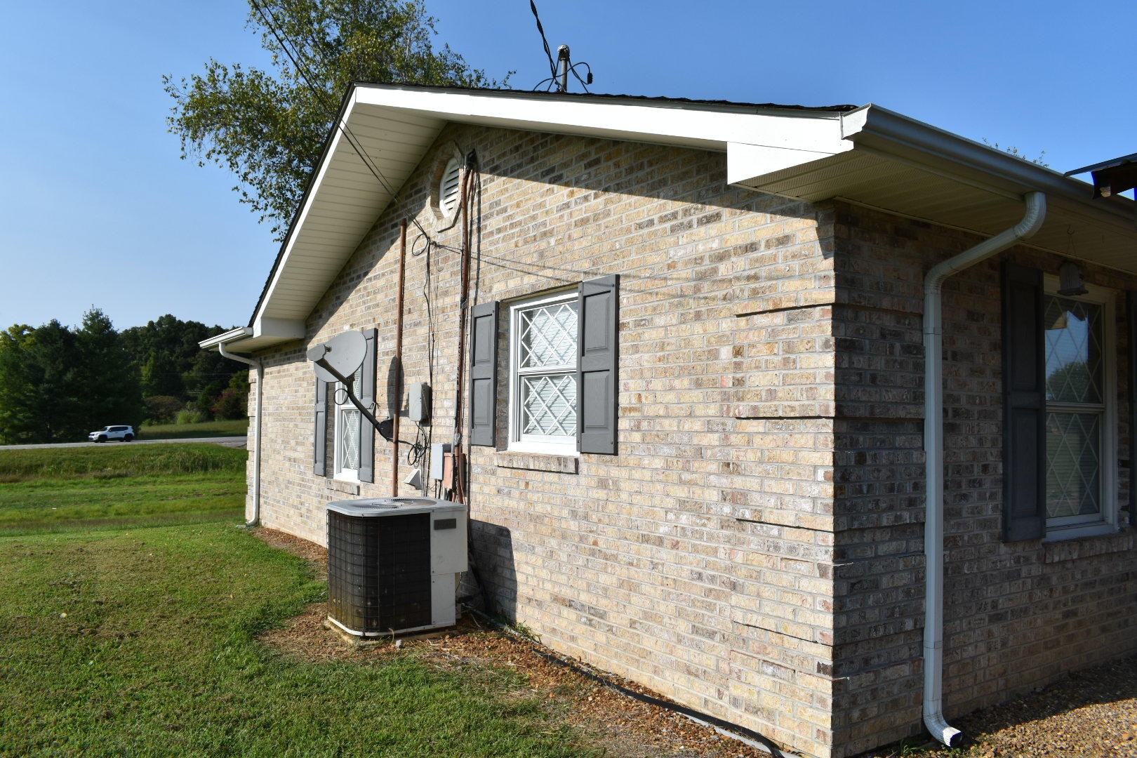 1513 Leatherwood Road Oneida, TN 37841 - Photo 6 of 37 a view of a house with a small yard