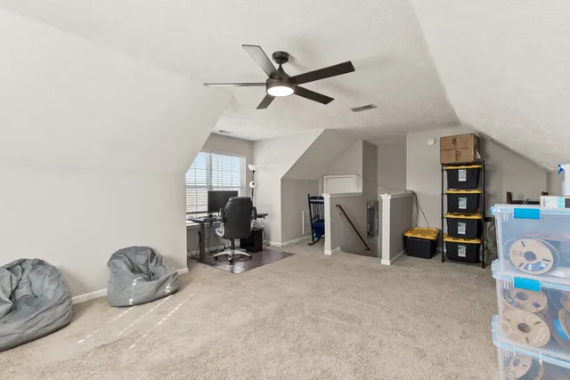 a room with furniture and a gym equipment