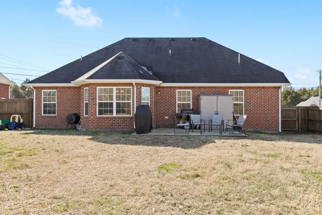 a view of a house with snow on the ground