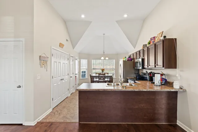 a room with lots of counter space and a mirror