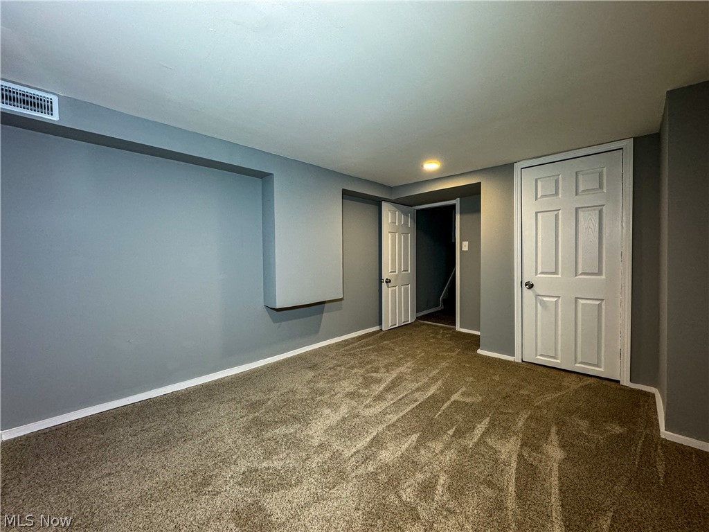 306 Robinson Road Campbell, OH 44405 - Photo 20 of 21 Unfurnished bedroom with dark carpet