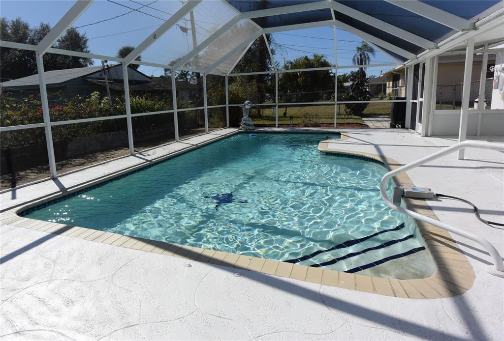 170 Argus Road Venice, FL 34293 - Photo 2 of 36 a view of a backyard with sitting area