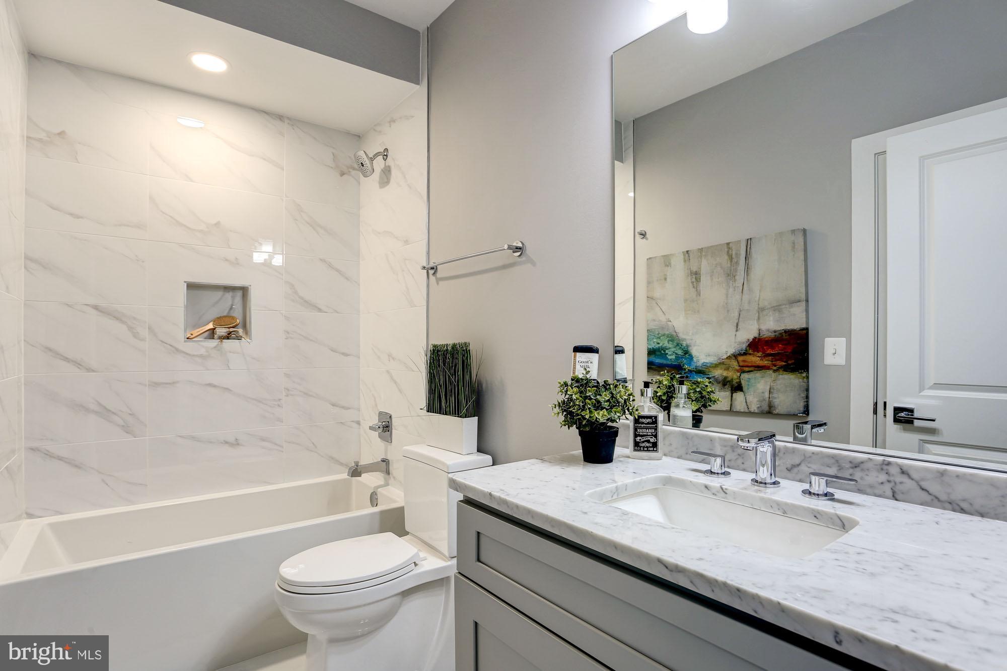 1220 Raum Street Northeast, Unit 2 Washington, DC 20002 - Photo 18 of 19 3rd full bath