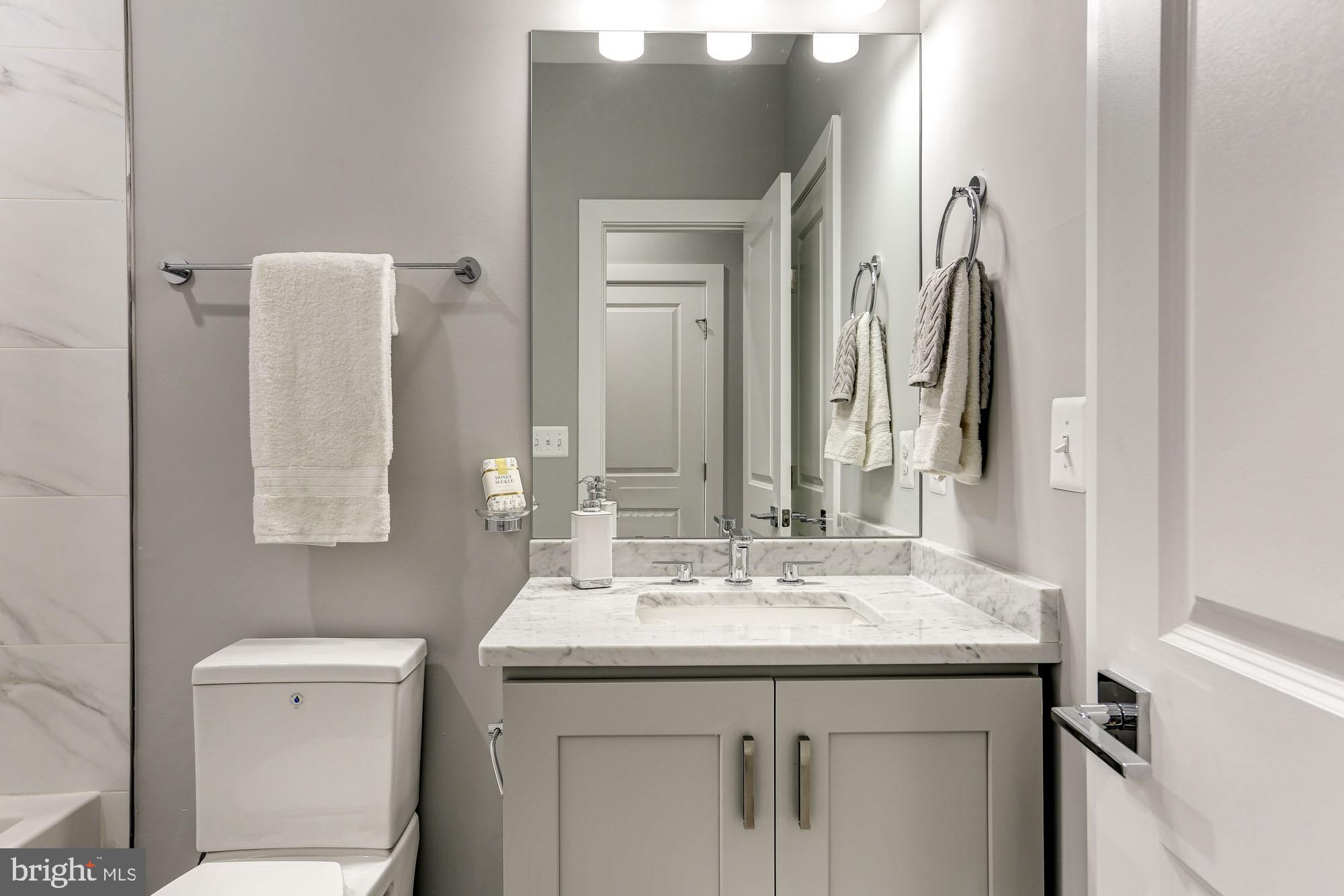 1220 Raum Street Northeast, Unit 2 Washington, DC 20002 - Photo 8 of 19 1st full bath