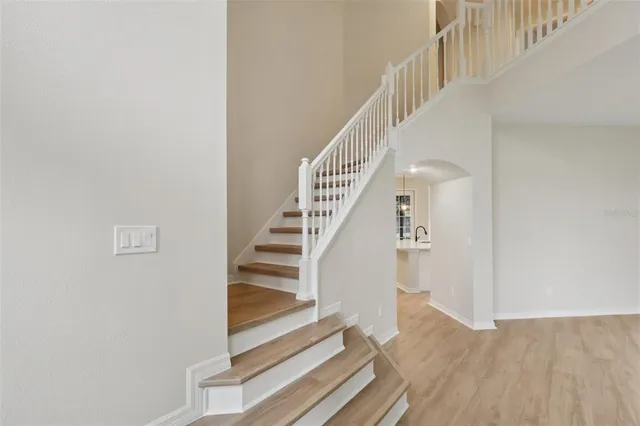 a view of entryway with wooden floor