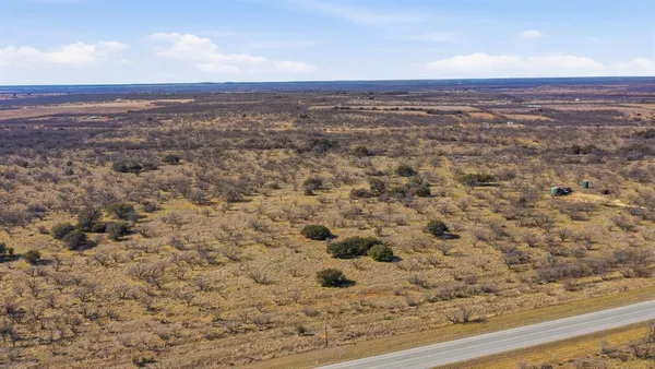 a view of a lake with a city