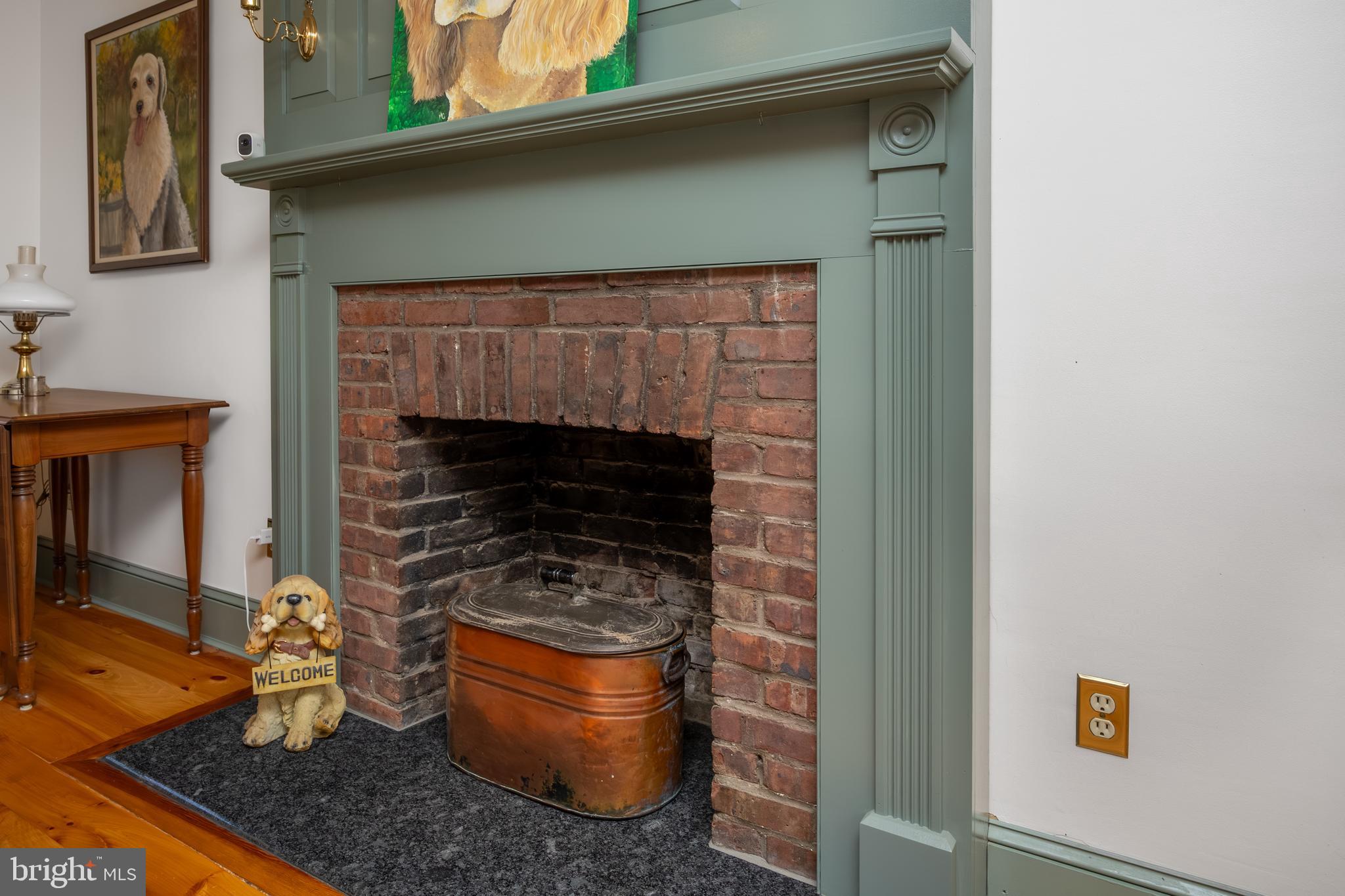 387 Tomlinson Road Huntingdon Valley, PA 19006 - Photo 9 of 30 Classic brick fireplace with upgraded trim
