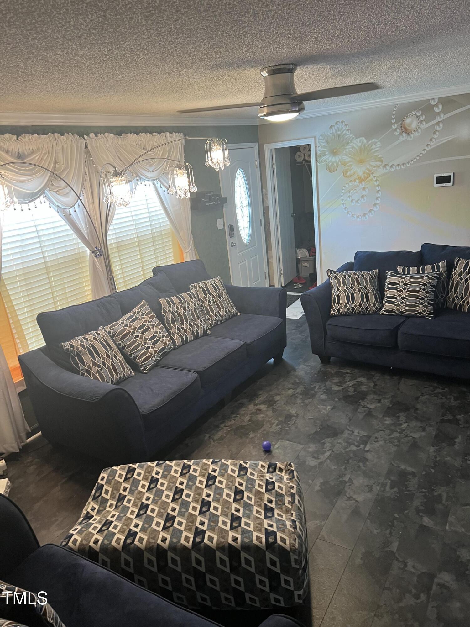 2455 McLean Chapel Church Road Bunnlevel, NC 28323 - Photo 9 of 21 a bedroom with a bed and a couch