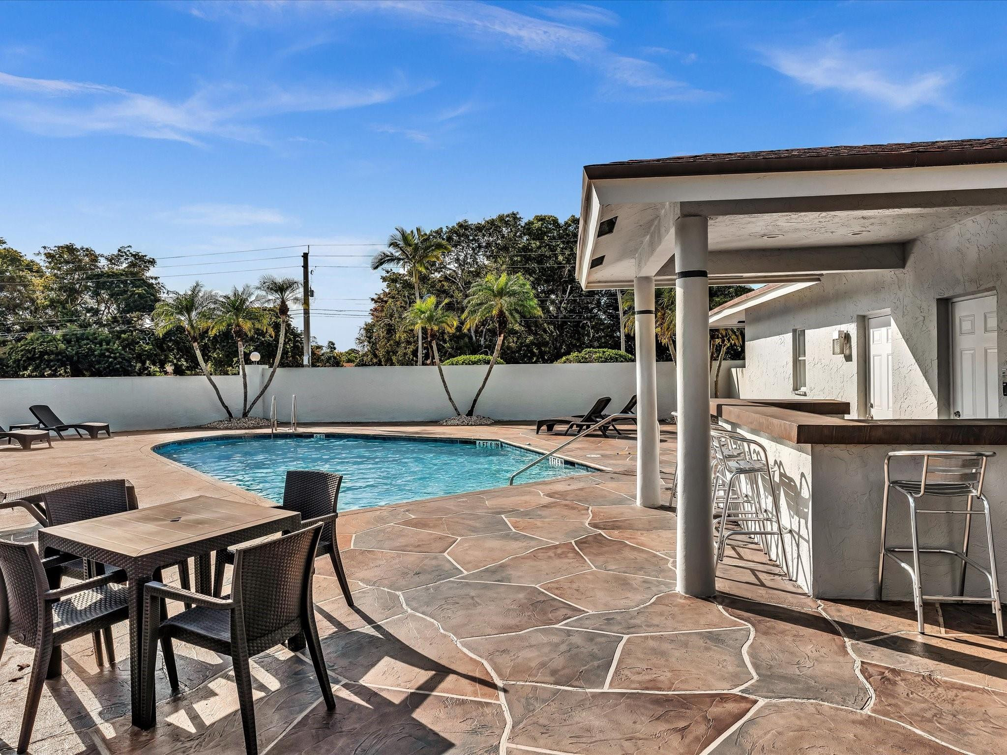 6796 North Pine Island Road, Unit 6796 Fort Lauderdale, FL 33321 - Photo 6 of 57 Community clubhouse and pool area
