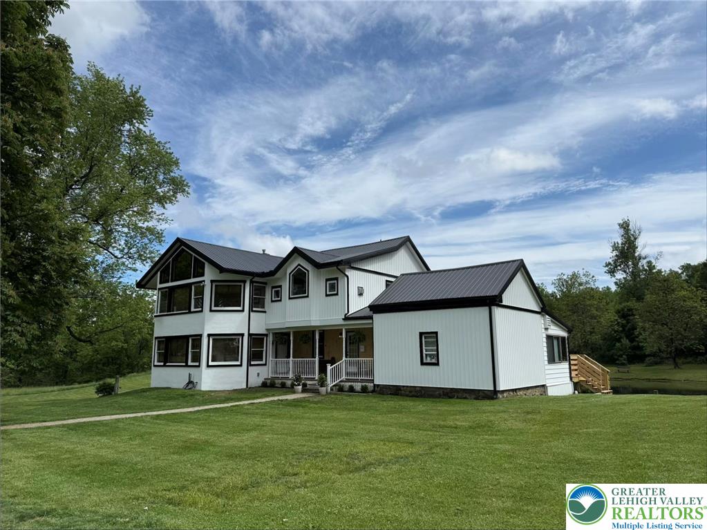 940 Jacktown Road Bangor, PA 18013 - Photo 1 of 33 A modern farmhouse design with striking black trim and a welcoming covered porch.