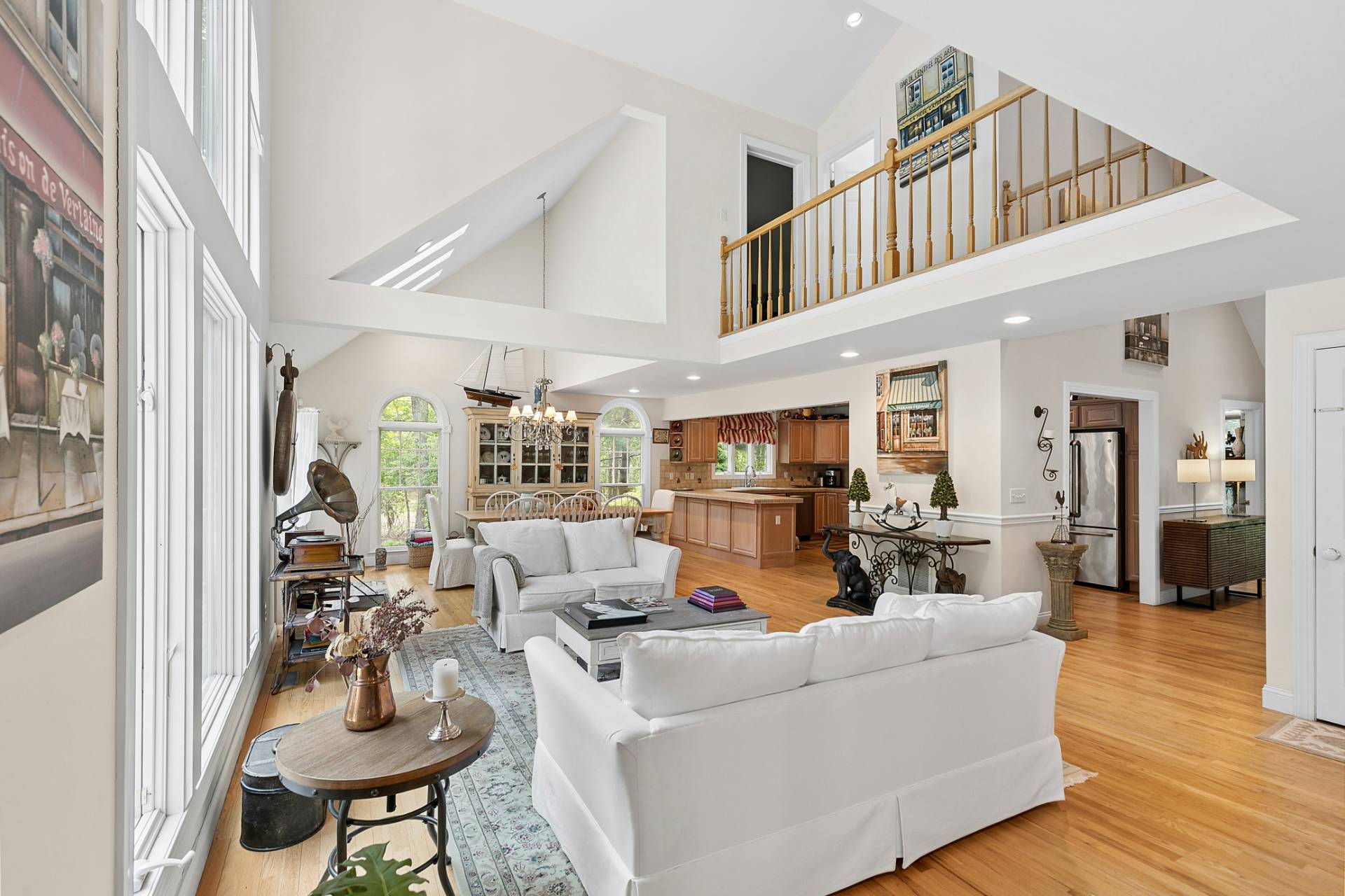 1557 Millstone Road Sag Harbor, NY 11963 - Photo 2 of 12 a living room with furniture and a wooden floor