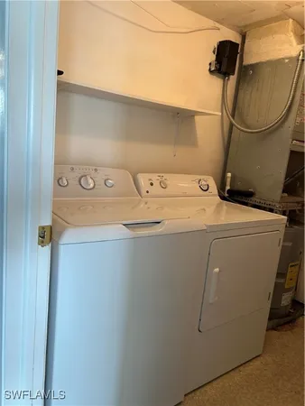 a view of swimming pool with lounge chair