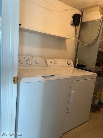 a view of swimming pool with lounge chair