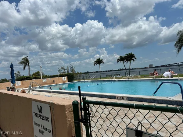 a view of dining room with furniture and wooden floor
