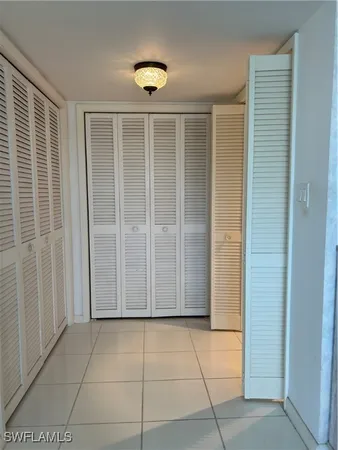 a bedroom with a bed and a table