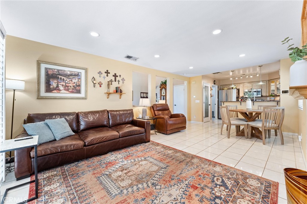 861 Shade Tree Way Corona, CA 92878 - Photo 11 of 47 View of family and dining rooms opens to the upgraded kitchen
