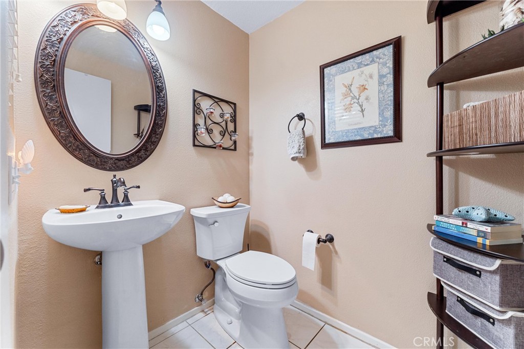861 Shade Tree Way Corona, CA 92878 - Photo 20 of 47 Powder room downstairs