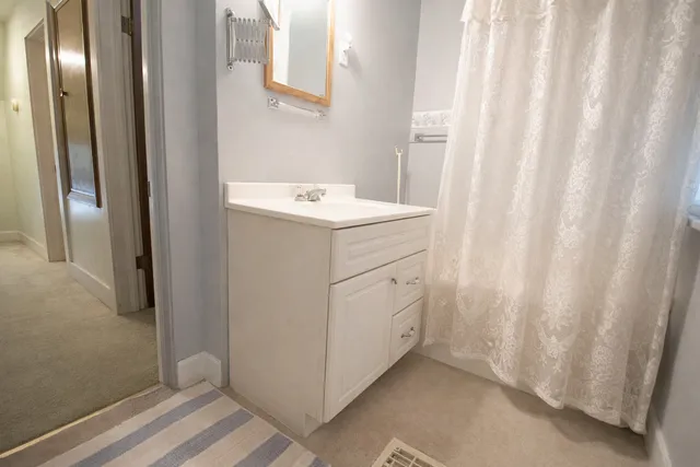 a utility room with cabinets