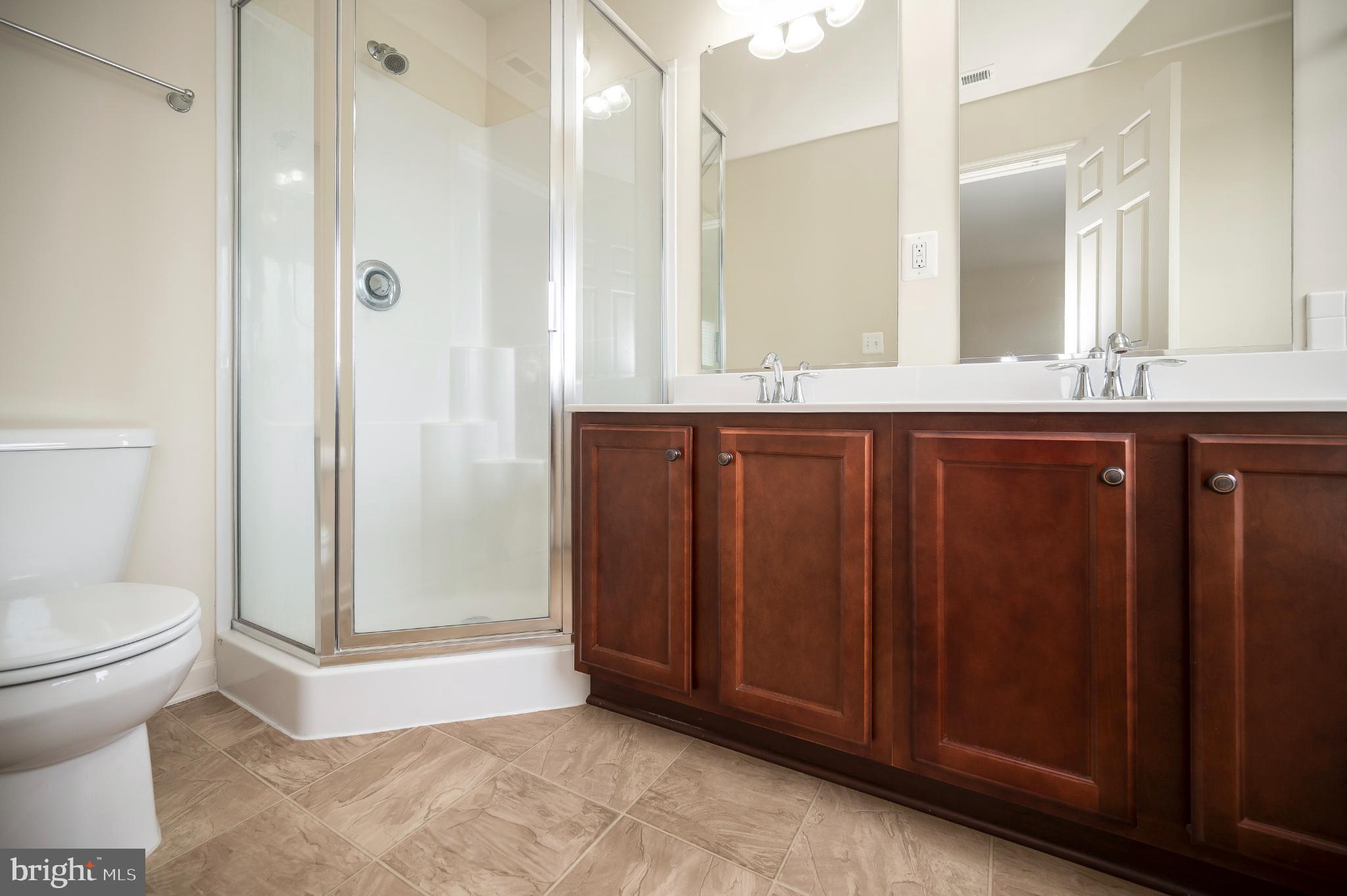 18323 Congressional Circle Ruther Glen, VA 22546 - Photo 27 of 75 Primary Bathroom w/ Double Sinks & Separate Shower