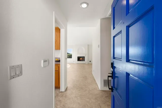 a kitchen that has a sink and a stove