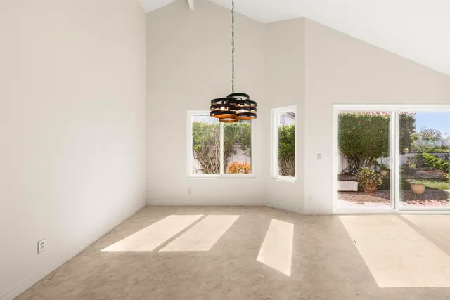 a view of a room with a large window