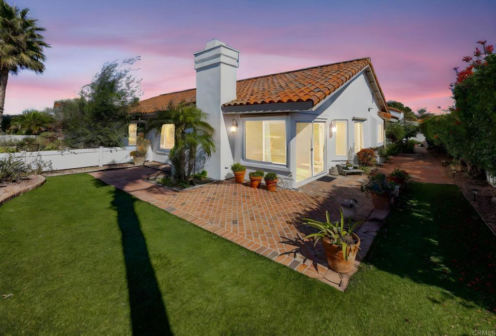 4125 Arcadia Way Oceanside, CA 92056 - Photo 21 of 51 a front view of a house with garden