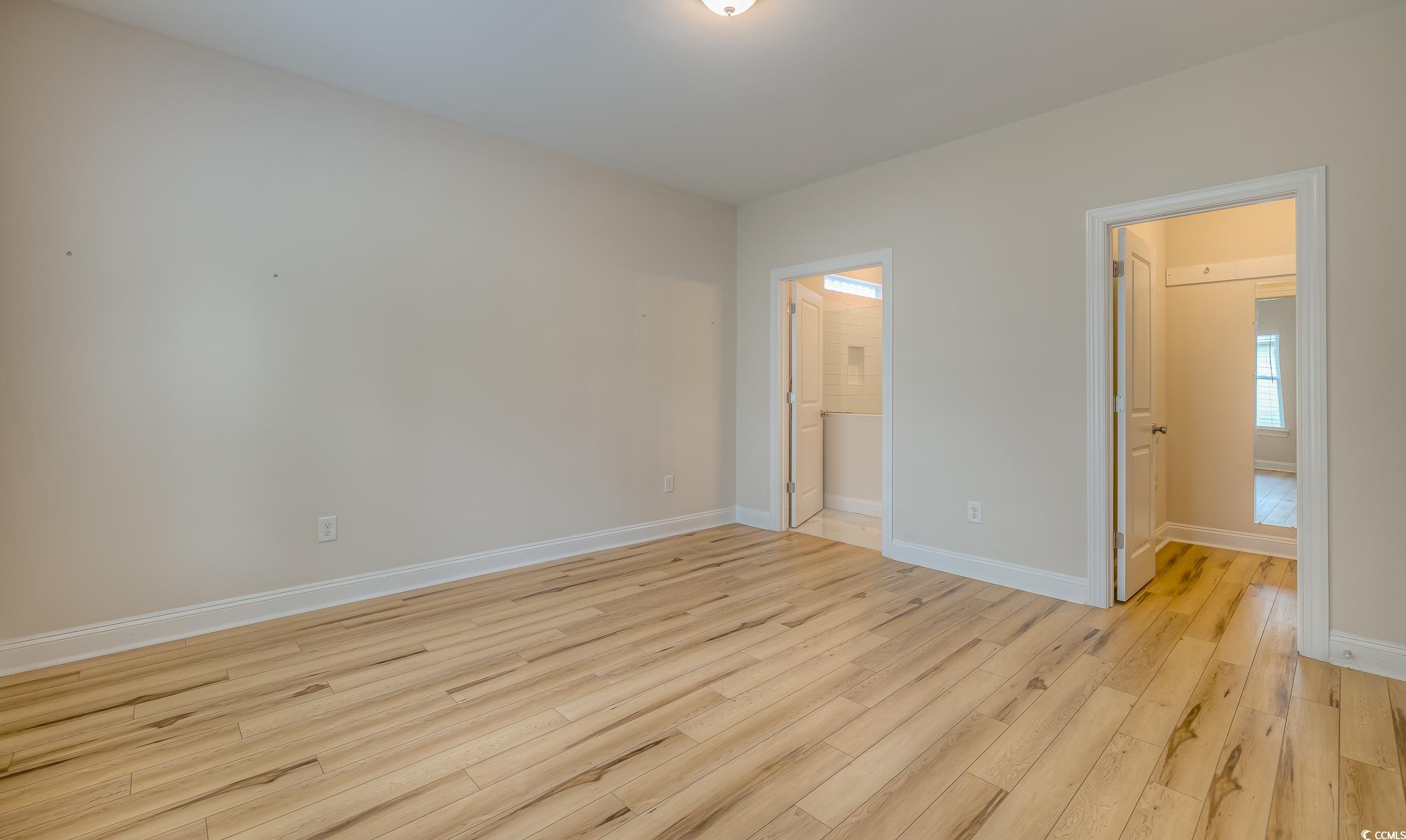 10 Saltwater Way Murrells Inlet, SC 29576 - Photo 11 of 30 Unfurnished bedroom with light hardwood / wood-sty