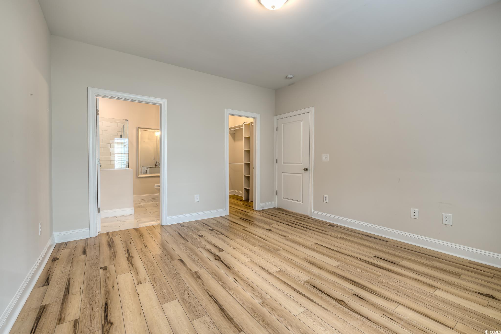 10 Saltwater Way Murrells Inlet, SC 29576 - Photo 12 of 30 Unfurnished bedroom featuring ensuite bath, a walk