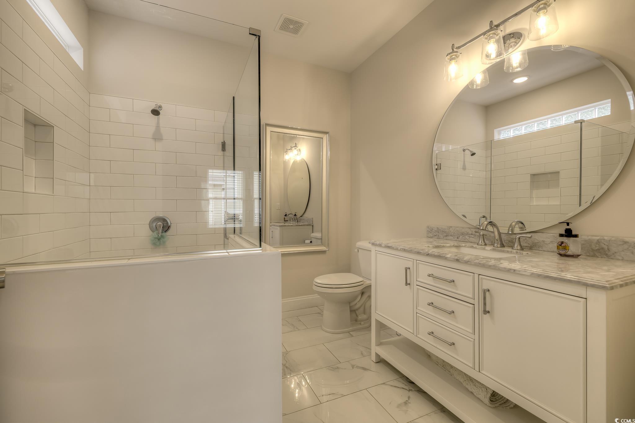 10 Saltwater Way Murrells Inlet, SC 29576 - Photo 13 of 30 Bathroom featuring vanity, tile patterned flooring